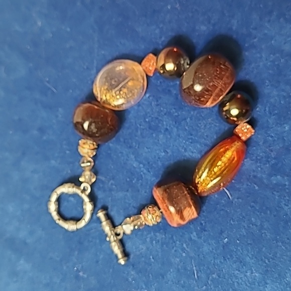 2/ $12 Chunky artisan made glass bracelet with ornate silvertone toggle - Picture 2 of 3